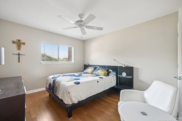 4111 Medical Dr Unit A 204, San Antonio, TX 78229 - bedroom featuring wood finished floors, baseboards, and a ceiling fan