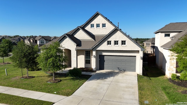 1105 Limestone, New Braunfels, TX 78132 - french country style house featuring a front yard, brick siding, an attached garage, a shingled roof, and driveway