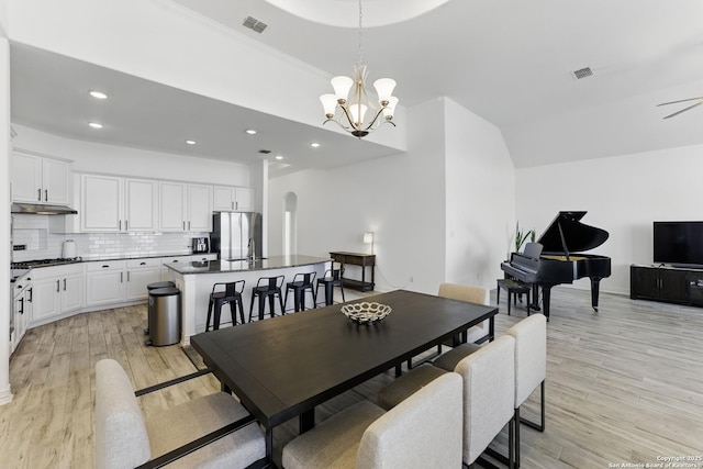 1105 Limestone, New Braunfels, TX 78132 - dining space with visible vents, recessed lighting, a chandelier, and light wood-style floors