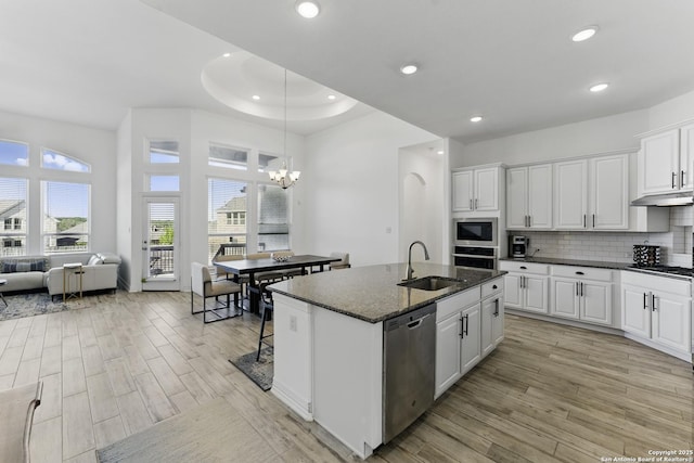 1105 Limestone, New Braunfels, TX 78132 - kitchen featuring stainless steel appliances, white cabinetry, and a sink