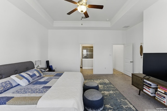 1105 Limestone, New Braunfels, TX 78132 - carpeted bedroom featuring crown molding, a tray ceiling, a ceiling fan, and visible vents
