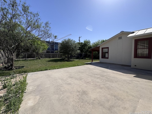 view of patio / terrace featuring fence