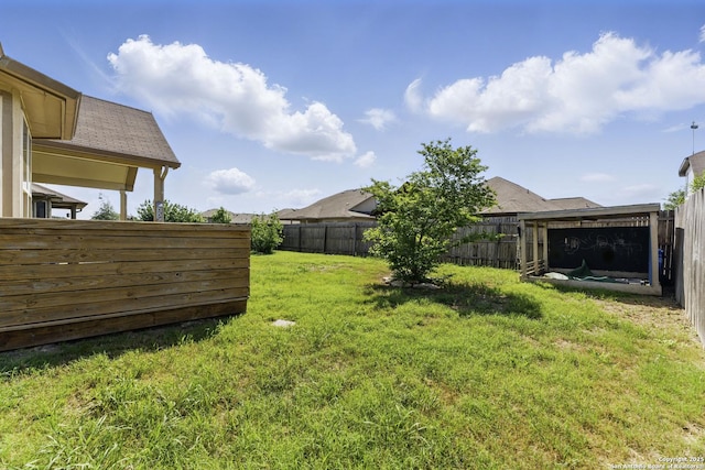 view of yard with a fenced backyard