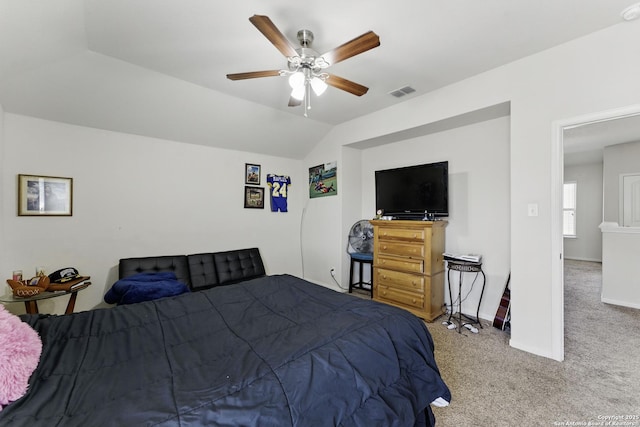 carpeted bedroom with visible vents, baseboards, a ceiling fan, and lofted ceiling