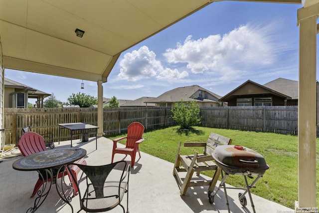 view of patio / terrace featuring grilling area and a fenced backyard