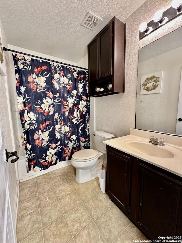 full bath featuring toilet, a textured ceiling, a textured wall, and visible vents
