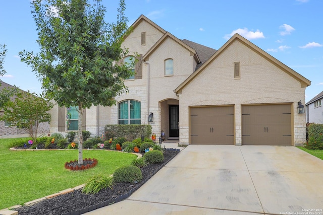 24929 Resort Pkwy, San Antonio, TX 78261 - french country inspired facade with a garage, a front yard, brick siding, and driveway