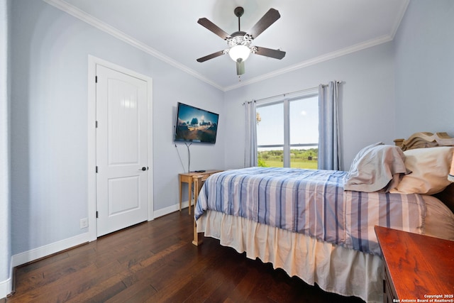 bedroom featuring a ceiling fan, baseboards, hardwood / wood-style floors, and ornamental molding