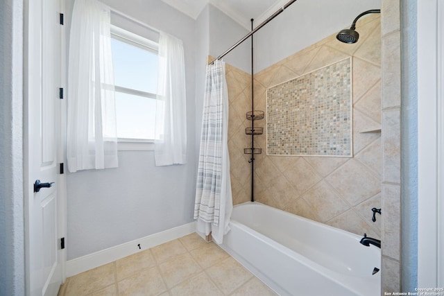 bathroom with baseboards and shower / bath combination with curtain