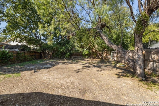 243 Alicia Ave, San Antonio, TX 78228 - view of yard with a fenced backyard