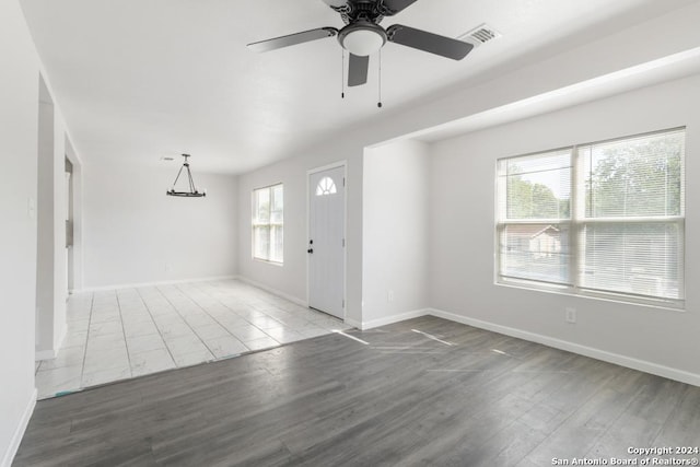 243 Alicia Ave, San Antonio, TX 78228 - interior space with wood finished floors, baseboards, a ceiling fan, and visible vents