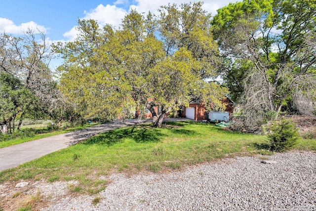 8114 Pimlico Ln, Boerne, TX 78015 - view of front of house featuring a front lawn and driveway