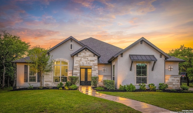 1064 Spanish Trl, New Braunfels, TX 78132 - french country home featuring a yard, french doors, stone siding, and a shingled roof