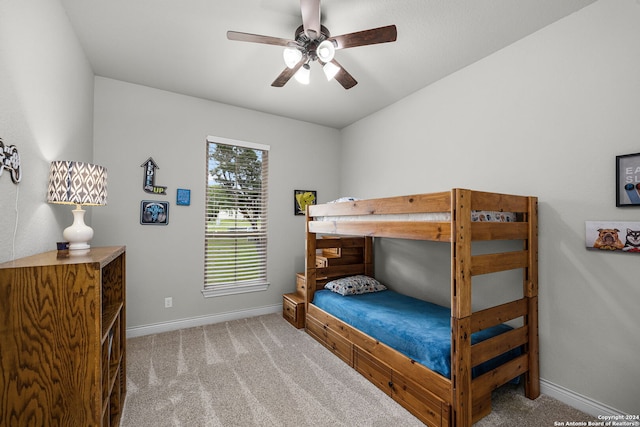 1064 Spanish Trl, New Braunfels, TX 78132 - carpeted bedroom with ceiling fan and baseboards