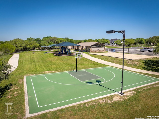 1064 Spanish Trl, New Braunfels, TX 78132 - view of sport court with community basketball court, a yard, and playground community
