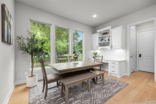 1064 Spanish Trl, New Braunfels, TX 78132 - dining area with recessed lighting, light wood finished floors, and baseboards