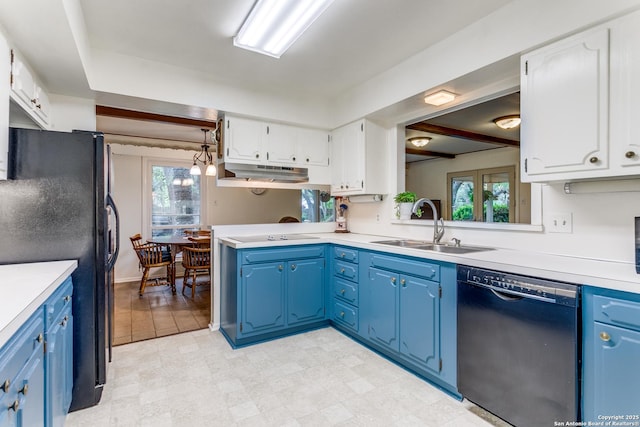 kitchen with black appliances, under cabinet range hood, a sink, and a healthy amount of sunlight