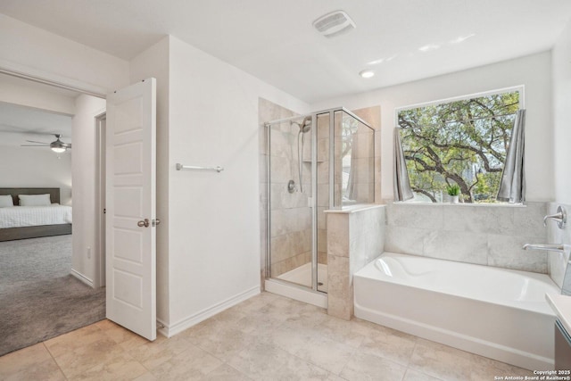 ensuite bathroom featuring a shower stall, visible vents, a garden tub, and a ceiling fan