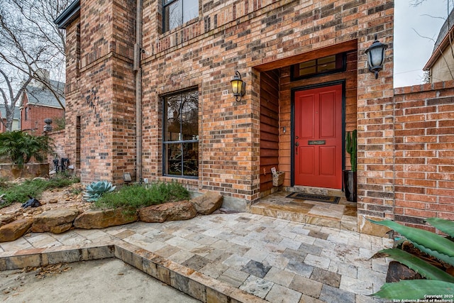 527 Thelma Dr, Olmos Park, TX 78212 - doorway to property with brick siding