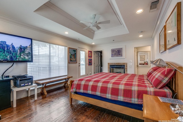 527 Thelma Dr, Olmos Park, TX 78212 - bedroom featuring ornamental molding, visible vents, recessed lighting, wood finished floors, and a raised ceiling