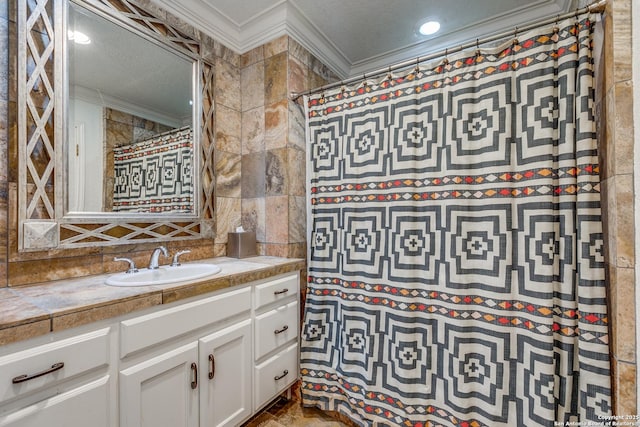 527 Thelma Dr, Olmos Park, TX 78212 - bathroom featuring ornamental molding, curtained shower, and vanity