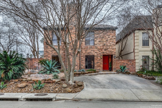 527 Thelma Dr, Olmos Park, TX 78212 - tudor-style house featuring brick siding and fence