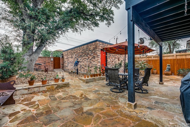527 Thelma Dr, Olmos Park, TX 78212 - view of patio / terrace with outdoor dining area and a fenced backyard