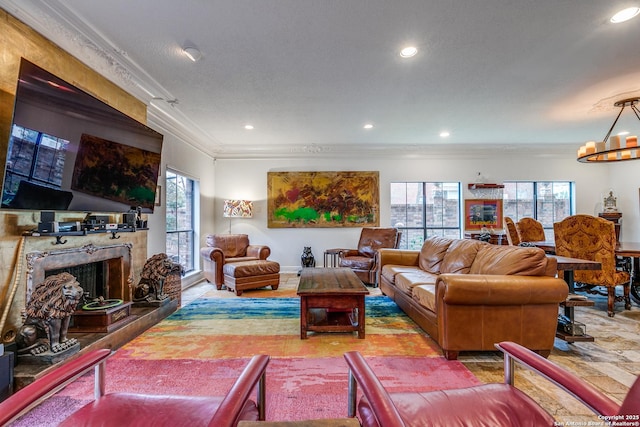 527 Thelma Dr, Olmos Park, TX 78212 - living area with ornamental molding, recessed lighting, a fireplace with raised hearth, and a notable chandelier