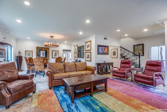 527 Thelma Dr, Olmos Park, TX 78212 - living area featuring a chandelier, a healthy amount of sunlight, and stairway