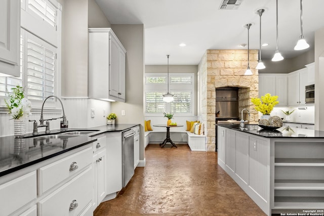 23954 Cibolo Vw, San Antonio, TX 78266 - kitchen with concrete flooring, white cabinets, visible vents, dishwasher, and a sink