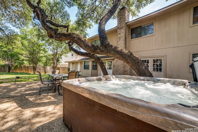 2910 Bee Cave, San Antonio, TX 78231 - view of patio / terrace featuring a hot tub and fence
