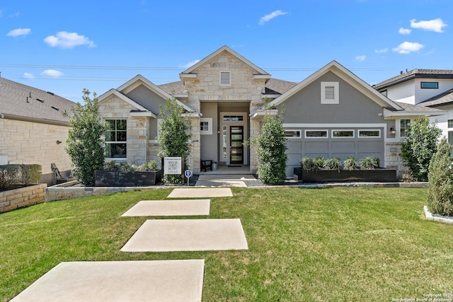 craftsman-style house with an attached garage, a front lawn, stone siding, and stucco siding