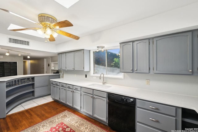 800 Eventide, Terrell Hills, TX 78209 - kitchen with gray cabinets, visible vents, dark wood finished floors, a sink, and black dishwasher