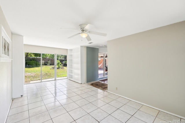 800 Eventide, Terrell Hills, TX 78209 - empty room with visible vents, ceiling fan, light tile patterned floors, and built in shelves