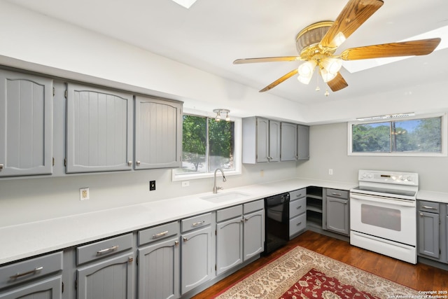 800 Eventide, Terrell Hills, TX 78209 - kitchen featuring dark wood-style flooring, white electric range oven, black dishwasher, a sink, and gray cabinetry