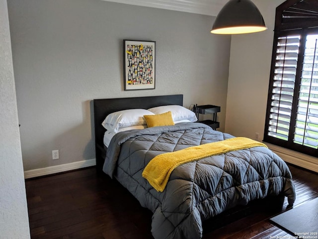 20918 Cactus Rdg, San Antonio, TX 78258 - bedroom featuring ornamental molding, baseboards, and hardwood / wood-style flooring