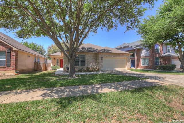 view of front of property featuring a garage, fence, a front lawn, brick siding, and concrete driveway
