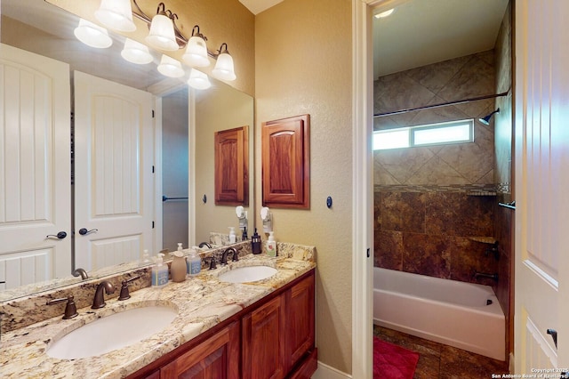 224 E Copper Trce, New Braunfels, TX 78132 - full bathroom with double vanity, shower / bathtub combination, baseboards, and a sink