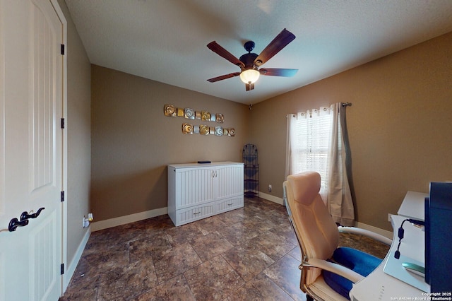 224 E Copper Trce, New Braunfels, TX 78132 - office area with stone finish floor, baseboards, and a ceiling fan