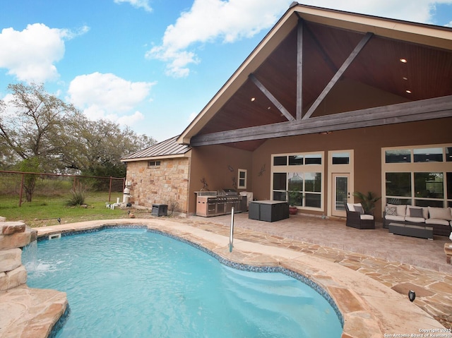 224 E Copper Trce, New Braunfels, TX 78132 - view of swimming pool with an outdoor living space, an outdoor kitchen, a patio, fence, and a fenced in pool