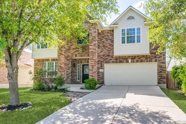 view of front of house with brick siding, a front yard, an attached garage, and concrete driveway
