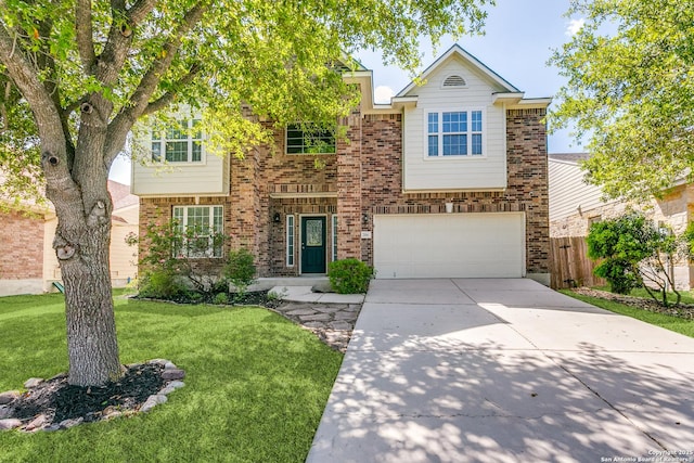view of front of home with concrete driveway, an attached garage, a front yard, brick siding, and fence