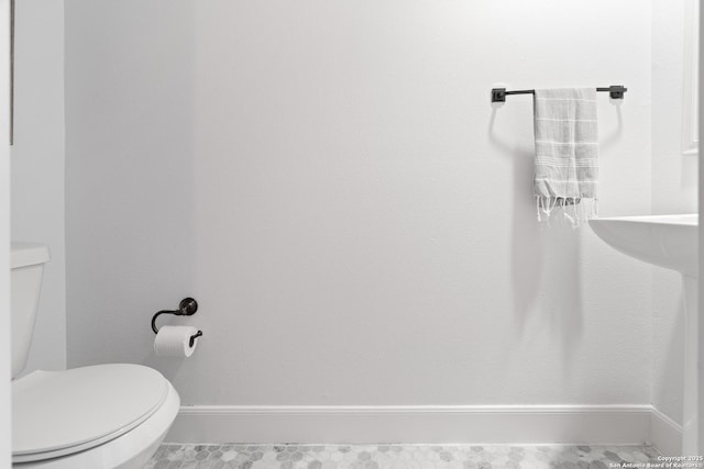 19211 Tierra Cv, San Antonio, TX 78258 - bathroom with toilet and baseboards
