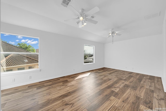 19211 Tierra Cv, San Antonio, TX 78258 - empty room featuring visible vents, ceiling fan, wood finished floors, and baseboards