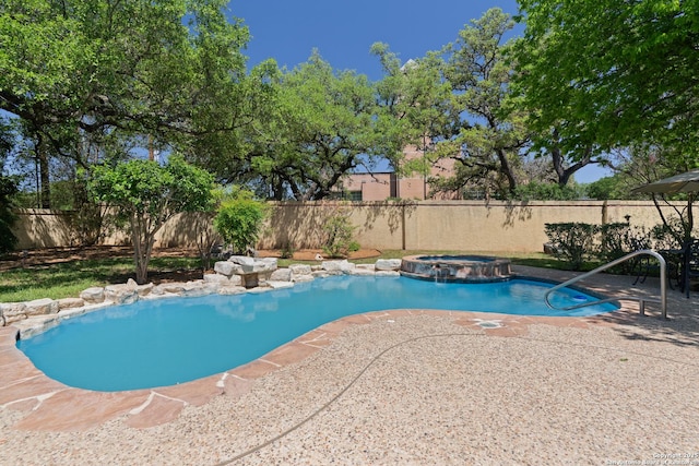 19211 Tierra Cv, San Antonio, TX 78258 - view of pool featuring a patio area, a fenced backyard, and a pool with connected hot tub