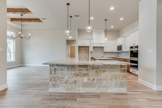200 Bobby Lynn, Adkins, TX 78101 - kitchen featuring recessed lighting, light wood-style floors, visible vents, stainless steel appliances, and a sink