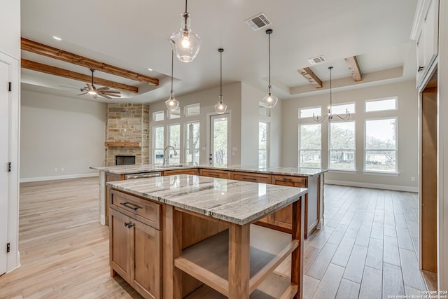 200 Bobby Lynn, Adkins, TX 78101 - kitchen featuring beam ceiling, a spacious island, and a raised ceiling