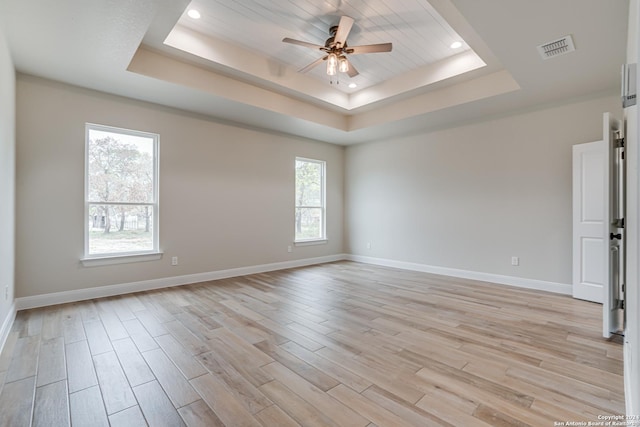 200 Bobby Lynn, Adkins, TX 78101 - spare room featuring recessed lighting, light wood finished floors, a tray ceiling, and ceiling fan
