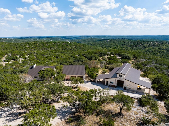 320 Overland Trl W, Hunt, TX 78024 - aerial view featuring a forest view