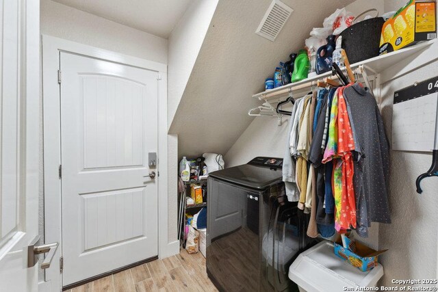 2047 Thicket Trail Dr, San Antonio, TX 78248 - washroom with visible vents, washer / dryer, wood finished floors, and laundry area